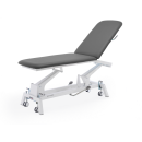 Dwuczęściowy stół rehabilitacyjny Gymna.GO D1e z regulowanym zagłówkiem i otworem na twarz.