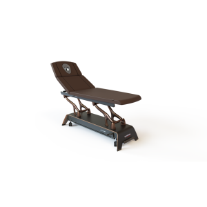 Stół do masażu i rehabilitacji Gymna.ONE T7 w ciemnobrązowej tapicerce, z elektryczną regulacją i otworem na twarz.