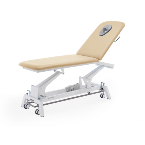 Stół do masażu i rehabilitacji Gymna.GO D1e w kolorze beżowym, z elektryczną regulacją wysokości.