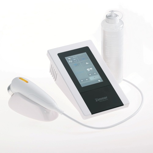 SonoOne – urządzenie do terapii ultradźwiękowej z głowicą zabiegową i żelem.