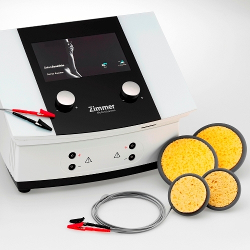 VacoS Zimmer – aparat do terapii podciśnieniowej z akcesoriami i przewodami elektrostymulacyjnymi.